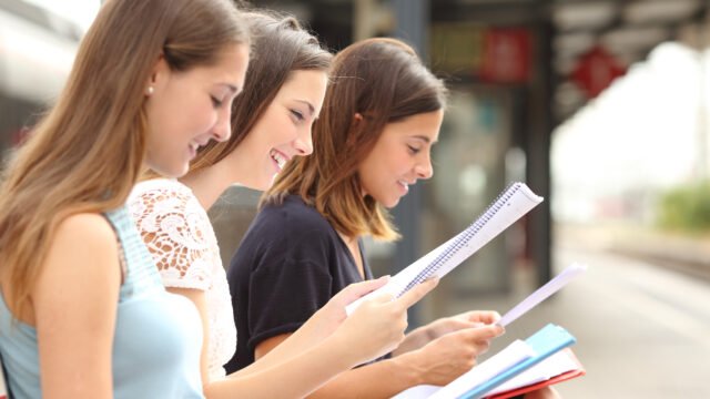 Profile,Of,Three,Students,Studying,And,Learning,Reading,Notes,In