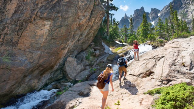 Family,On,Summer,Vacation,Trip,In,The,Mountains.,People,Hiking