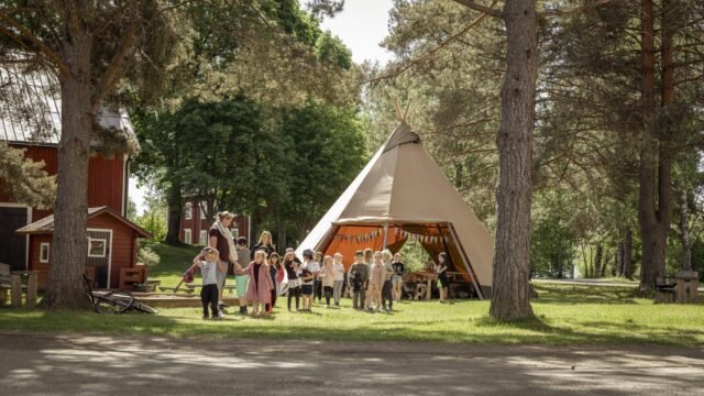 children-group-outside-tipi