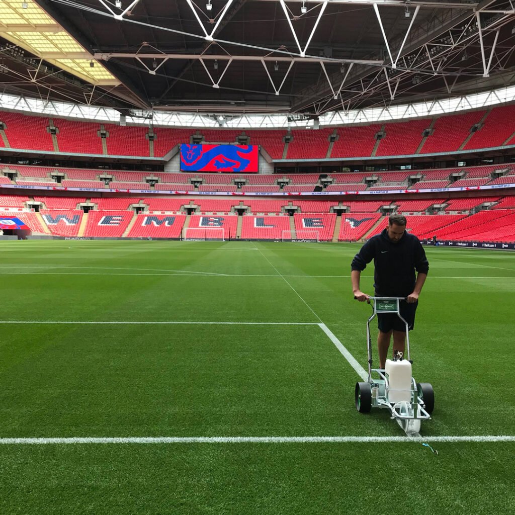 Hybrid-spray-marker-and-Ecoline-Plus-paint-at-Wembley-Stadium