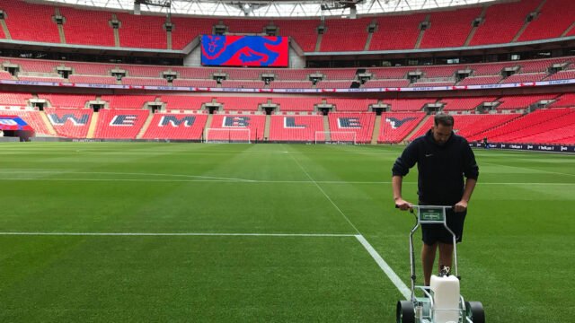 Hybrid-spray-marker-and-Ecoline-Plus-paint-at-Wembley-Stadium